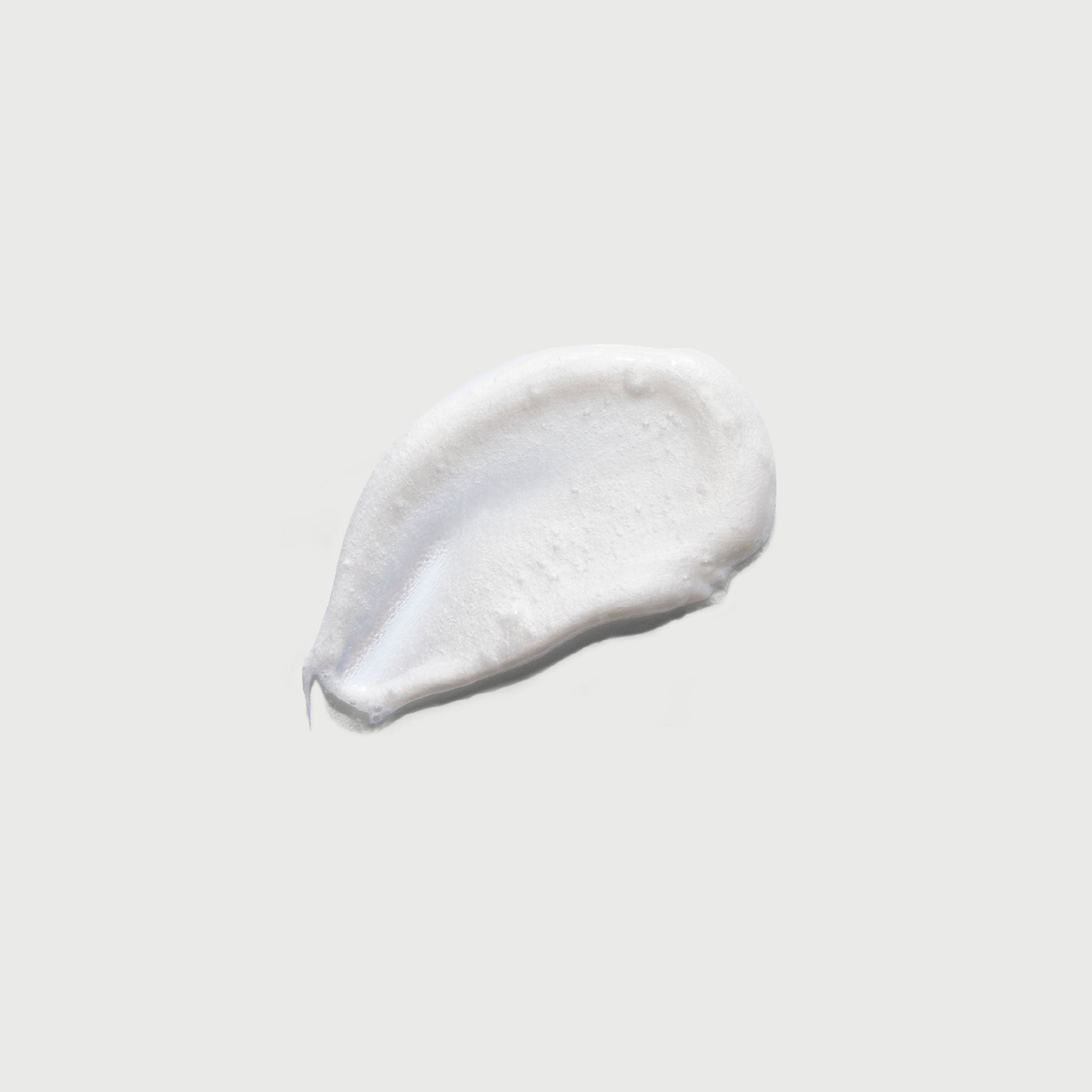 the-smoother-glycolic-acid-exfoliating-body-wash-c0 NATR-40002-Swatch-The-Smoother-Glycolic-Acid-Exfoliating-Body-Wash-bonebkgd.jpg