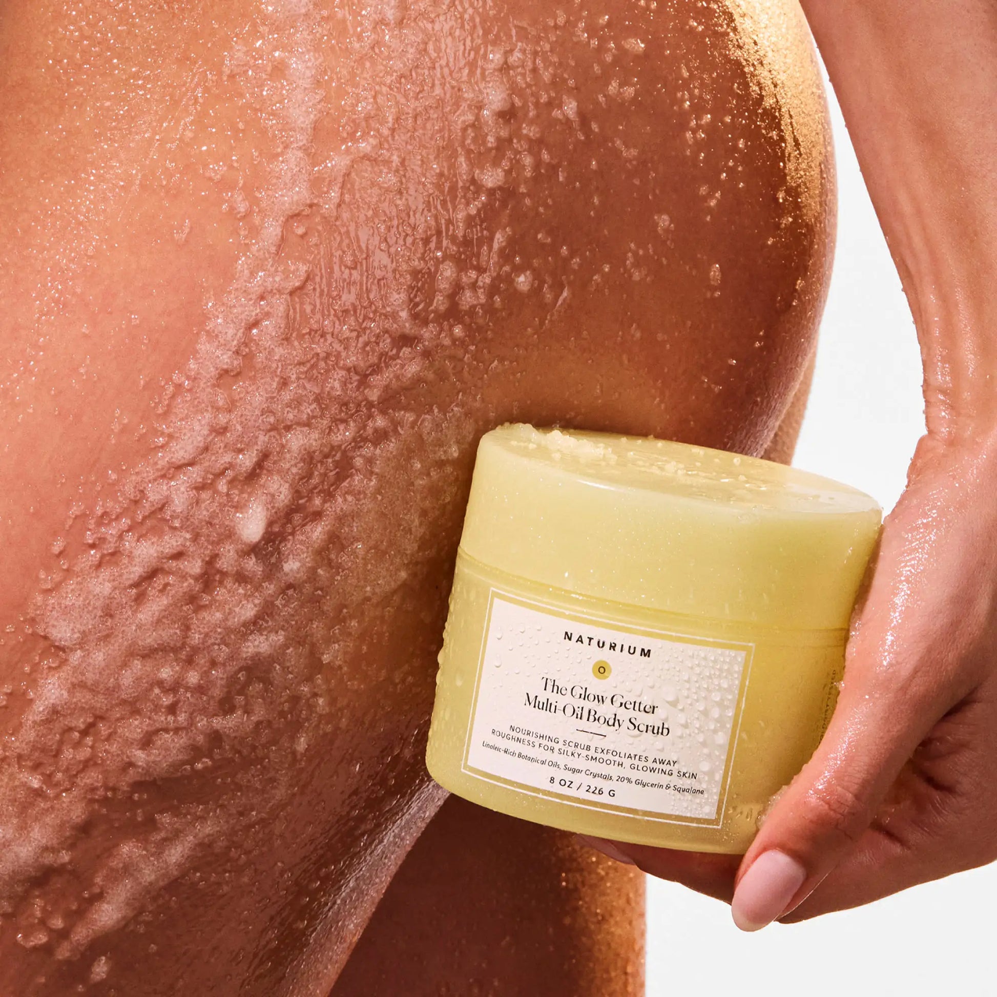 the-glow-getter-multi-oil-body-scrub-q1 NATR-40028-Alt-Image-The_Glow_Getter_Multi-Oil_Body_Scrub-07.webp