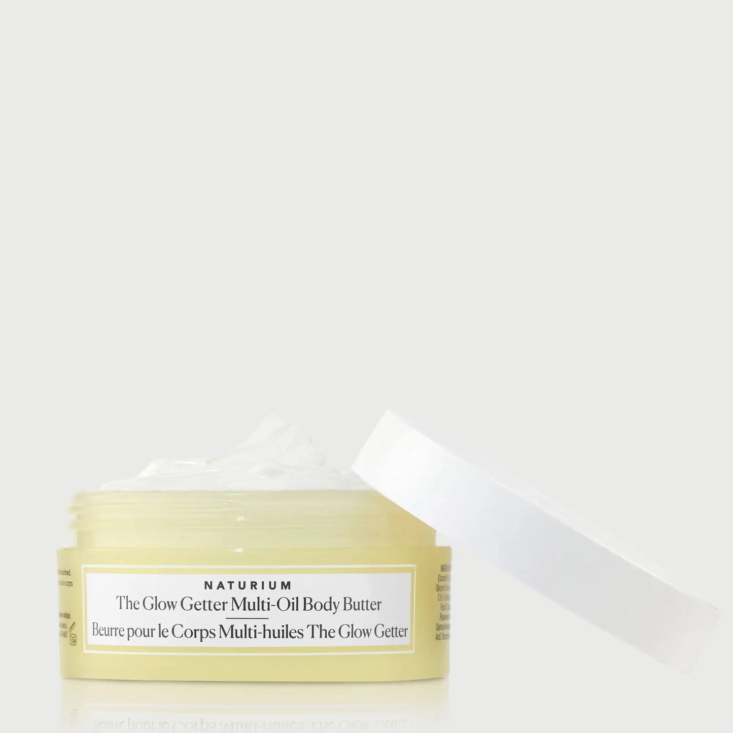 the-glow-getter-multi-oil-body-butter-travel-size-e6 NATR-40115_Glow-Getter-Body-Butter-Mini_front_capoff_bonebkgd.webp